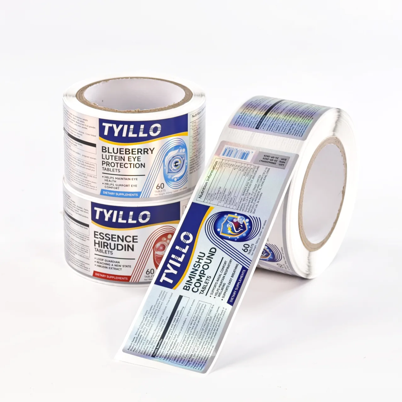 Drei holographische Etikettenrollen mit unterschiedlichen Designs
