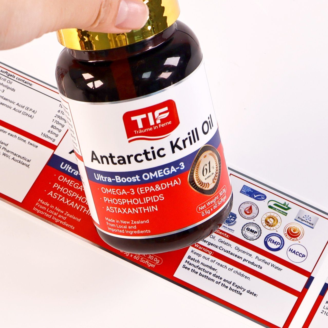 Hand holding supplement bottle showing in-hand label presentation