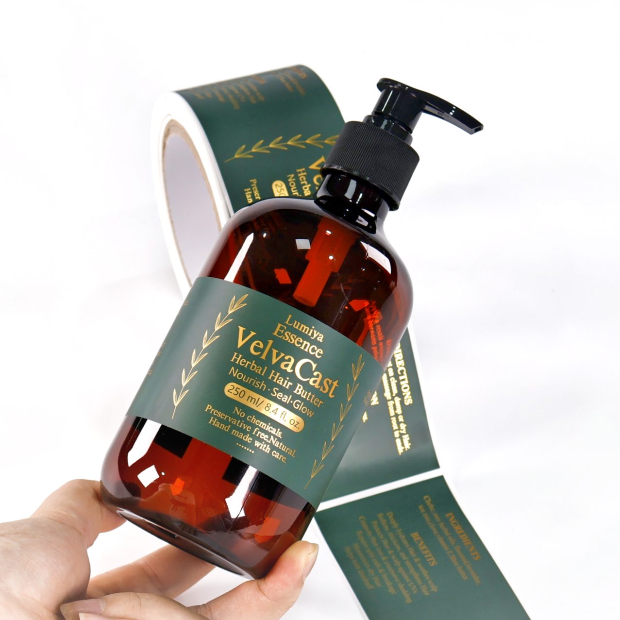 Silver BOPP label with metallic gold effect on hair care bottle