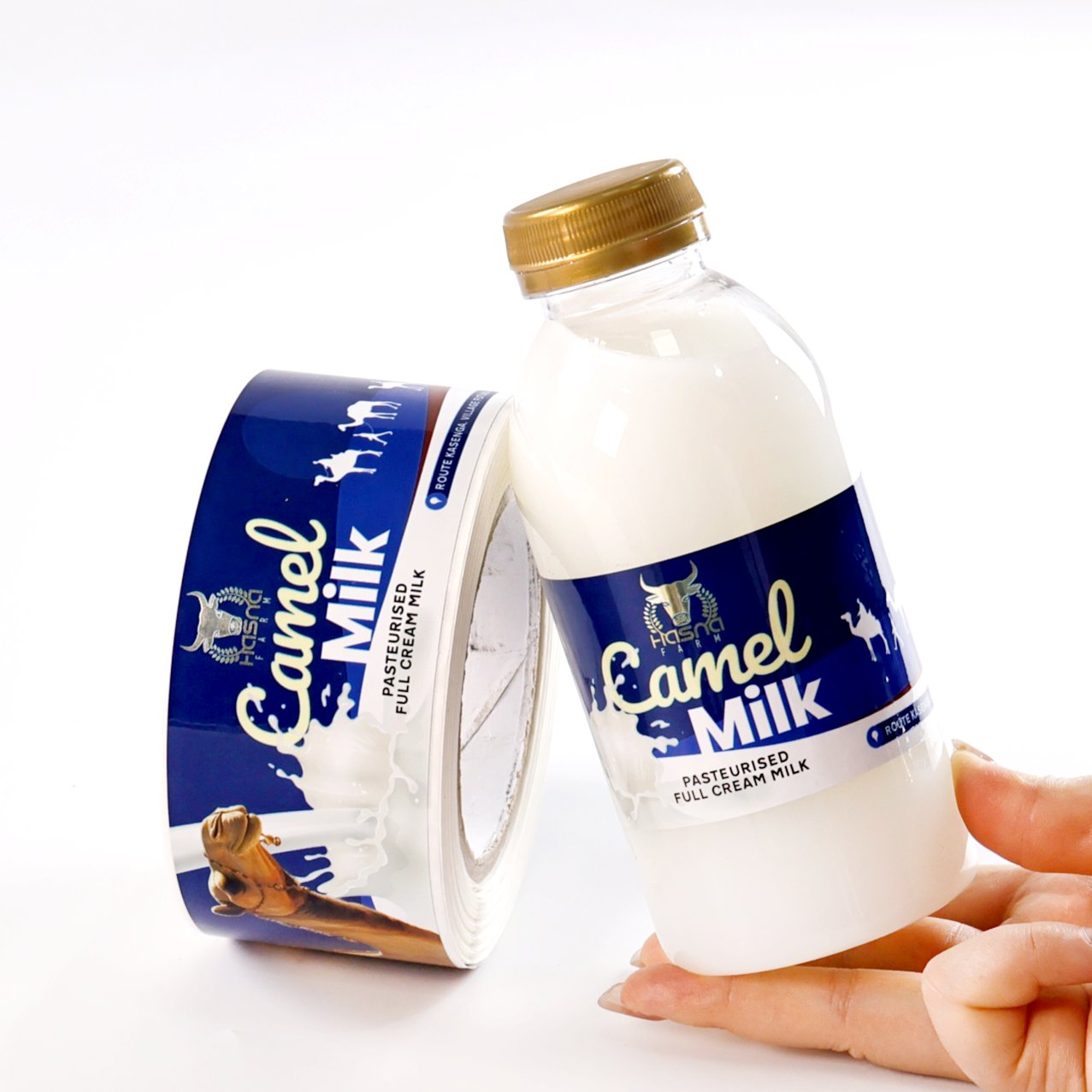 Camel milk bottle and label roll