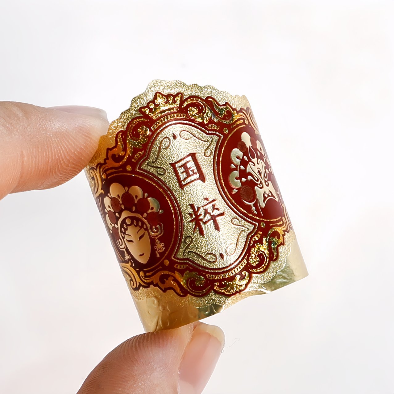 Gold foil stamping on dark label