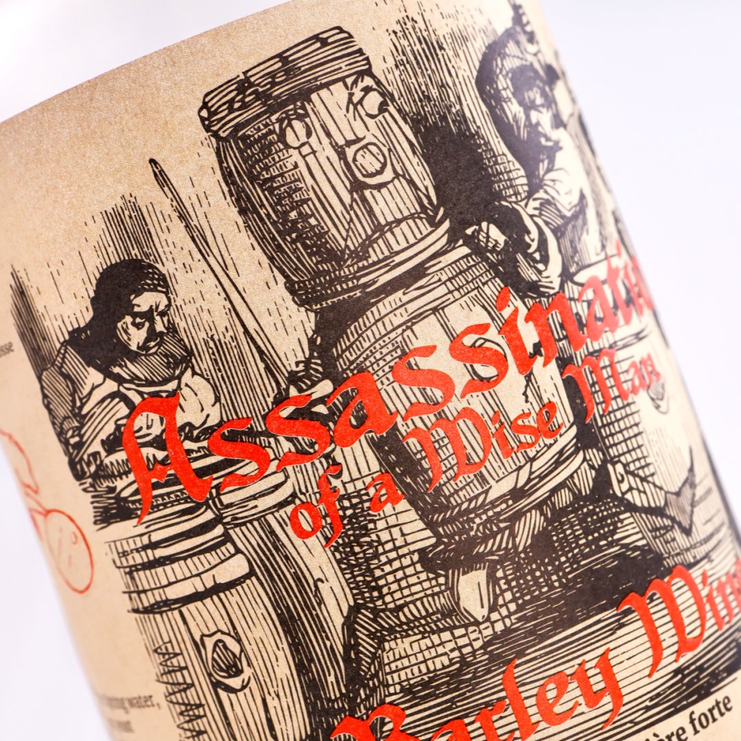 Kraft paper wine label with vintage woodcut illustration and red letterpress-style text