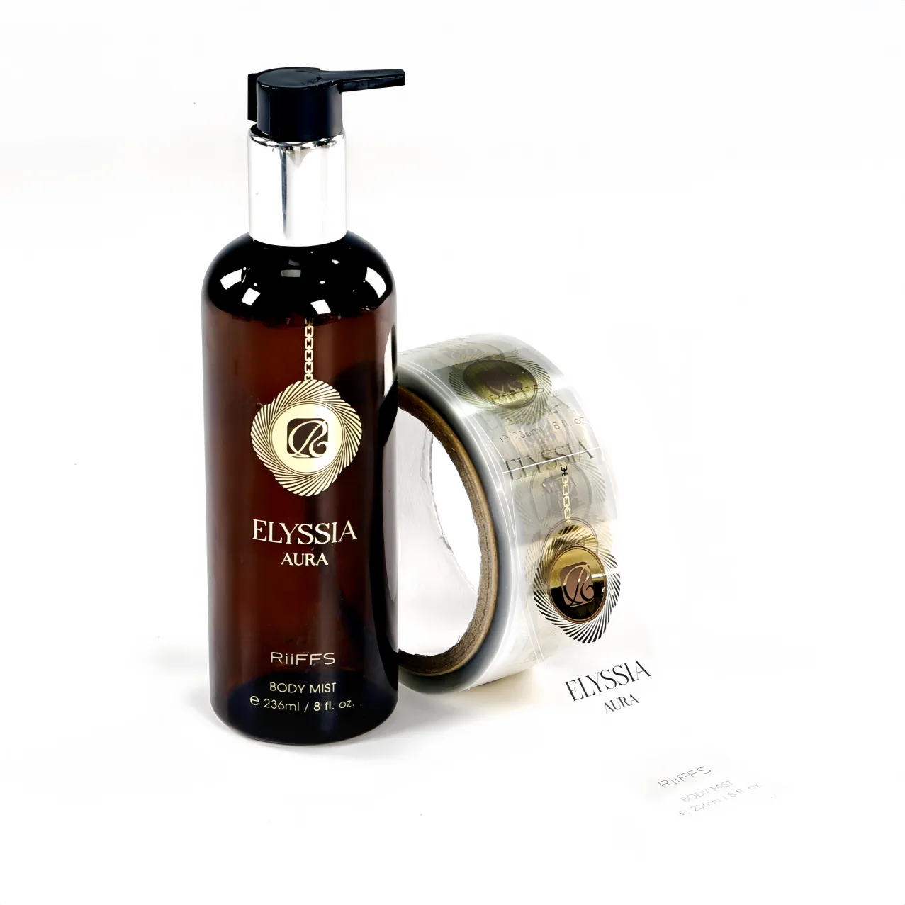 Clear label with gold foil stamping on a transparent base — DJB Print custom work