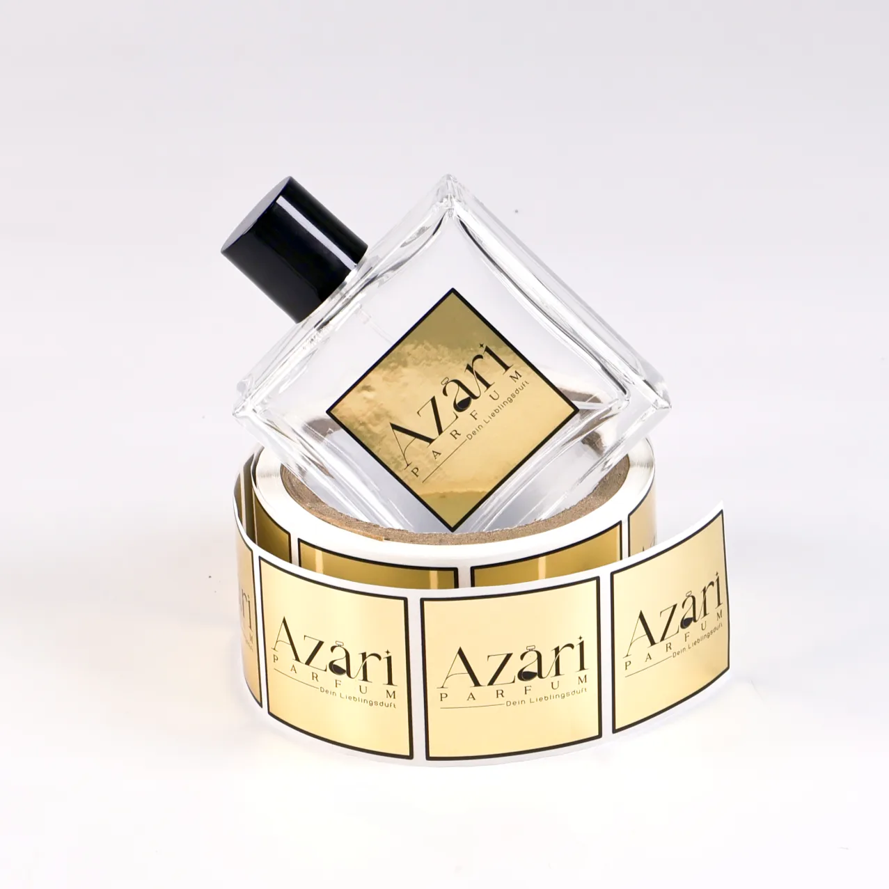 Gold foil stamped perfume label on clear PET - Azari Parfum