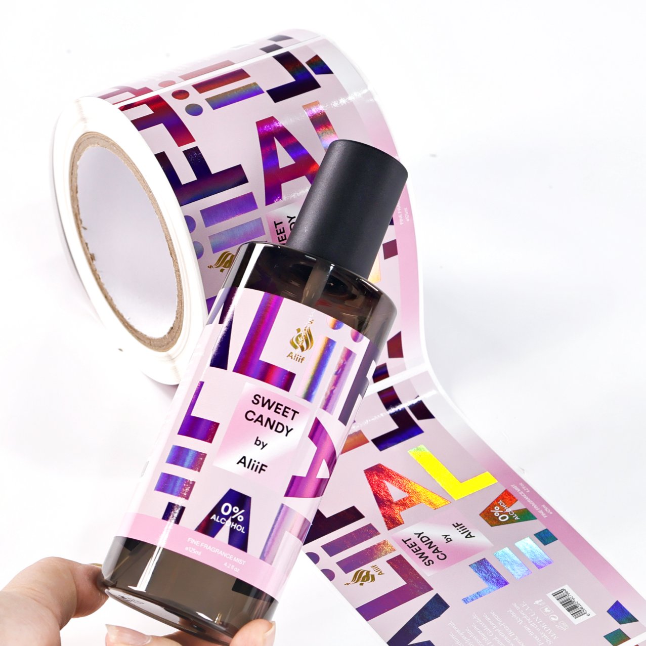 Holographic label applied on perfume bottle