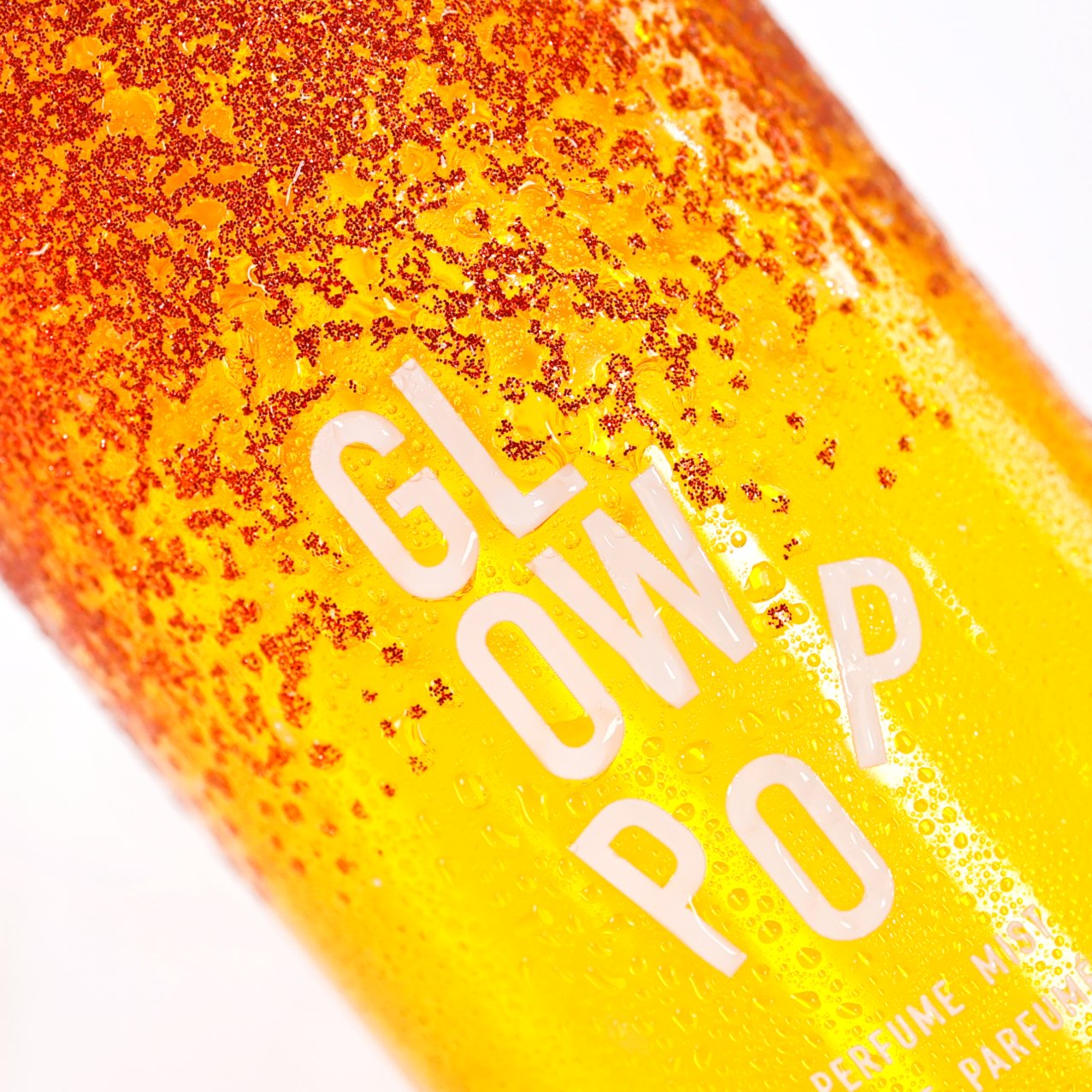 Glitter label on a perfume mist bottle - macro detail